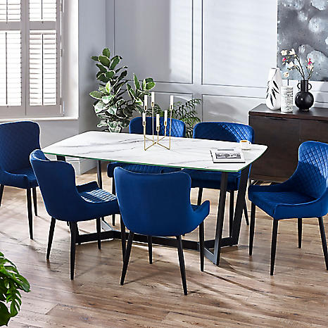 White marble table with blue online chairs