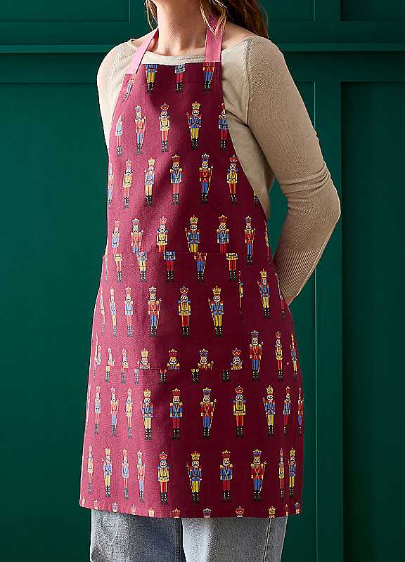 Catherine Lansfield 'Christmas Nutcracker' Cotton Kitchen Adult Apron in Plum - Image 9